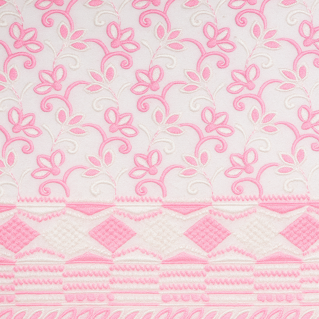 The woman chooses the fabric on the sofa. Textile industry background. Tissue catalog